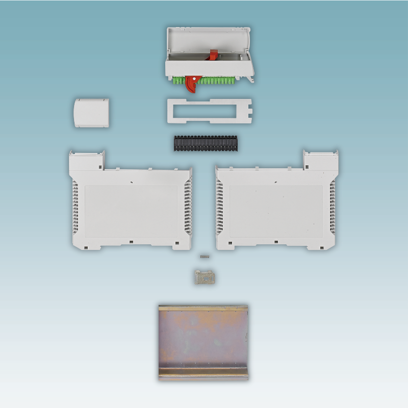 Fot.2 Kompletny zestaw deweloperski obudowy ME-PLC zawiera także fragment szyny montażowej. Jest ona znacznie szersza niż standardowa szyna DIN. Płytka uniwersalna dostępna jest jako element akcesoryjny. Fot.2 Kompletny zestaw deweloperski obudowy ME-PLC zawiera także fragment szyny montażowej. Jest ona znacznie szersza niż standardowa szyna DIN. Płytka uniwersalna dostępna jest jako element akcesoryjny.