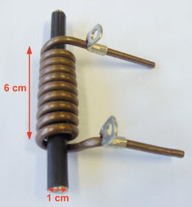 Widok ogólny wzbudnika nagrzewnicy indukcyjnej wraz ze wsadem stalowym
